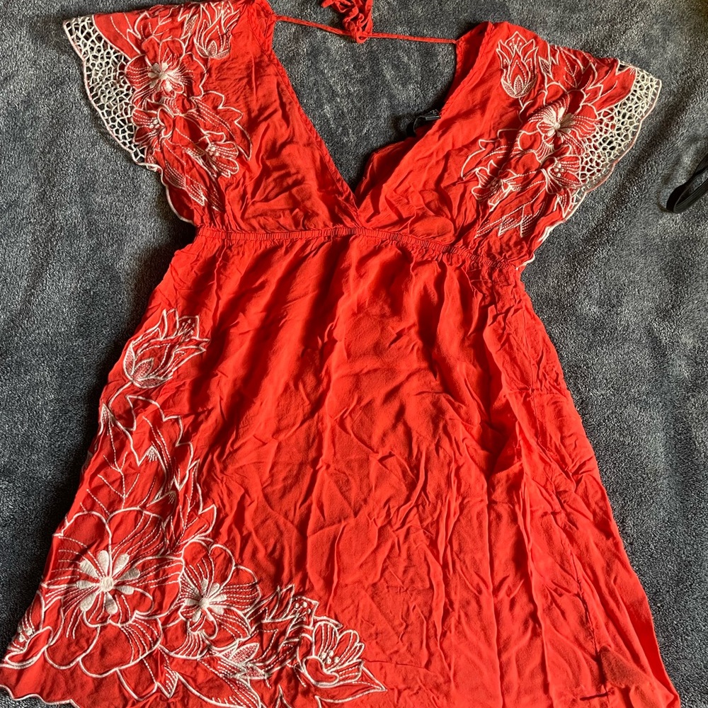 Bright orange floral shirt
